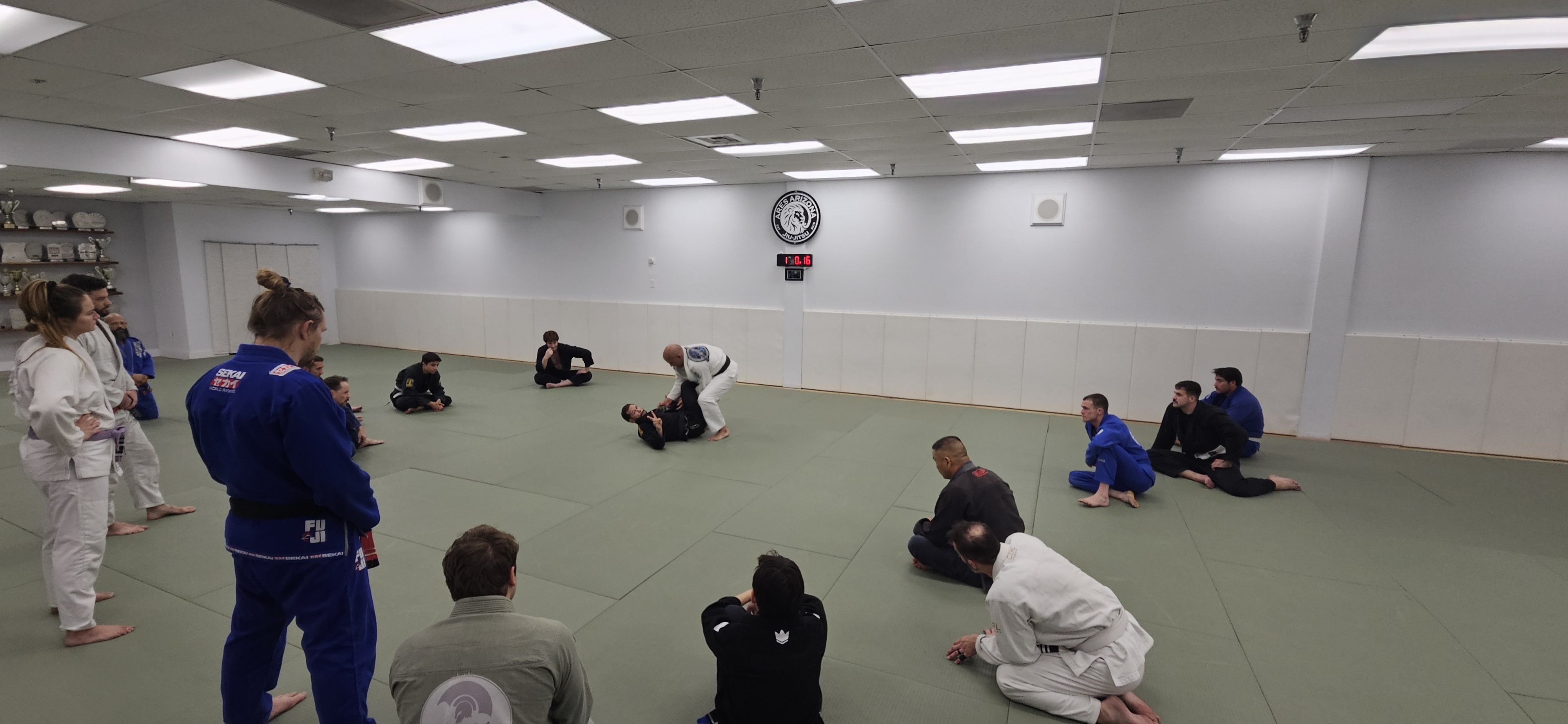 Adults training Brazilian Jiu-Jitsu at Ares Arizona
